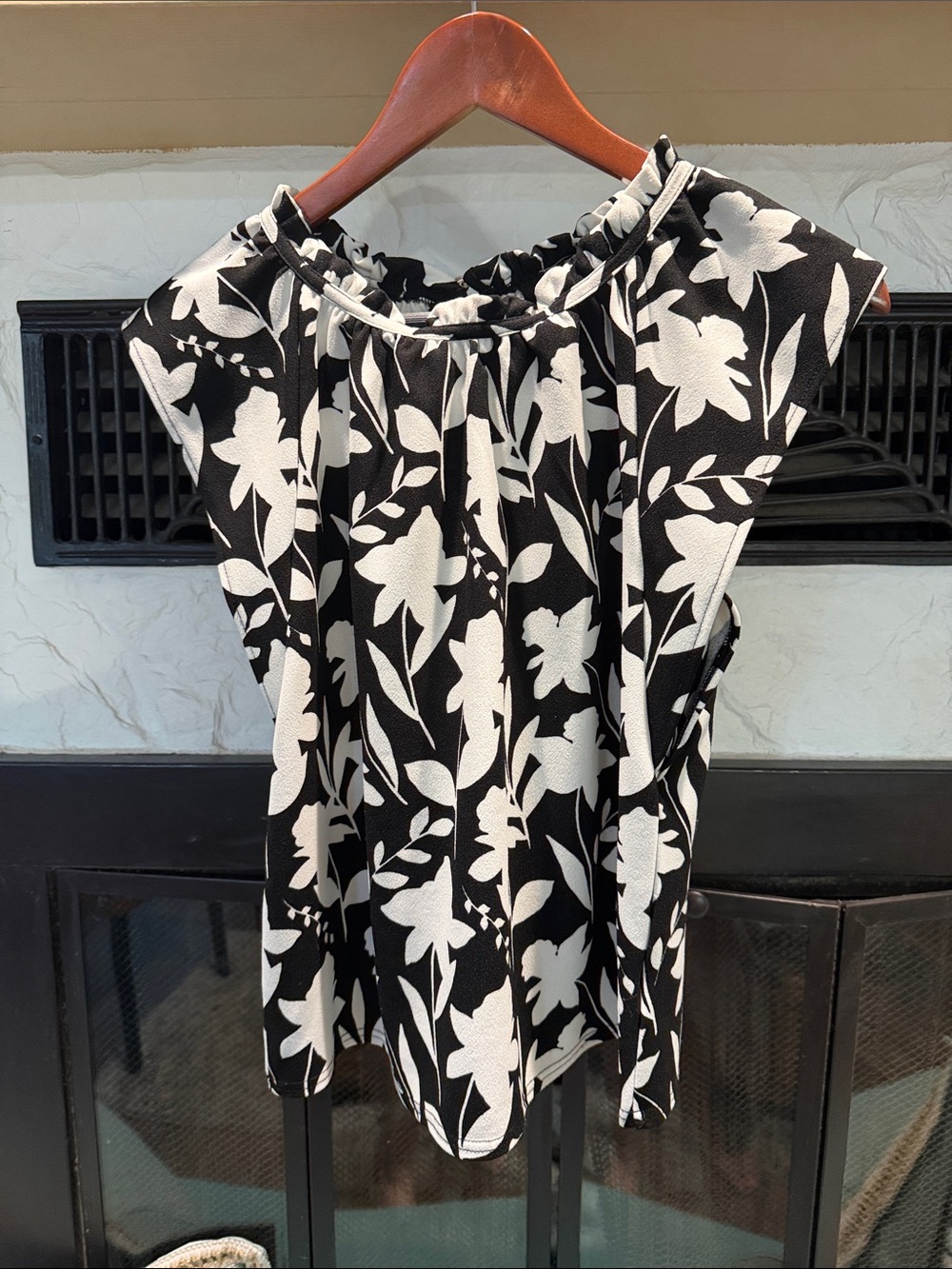 Sleeveless Black Floral Ruffle-Neck Blouse
